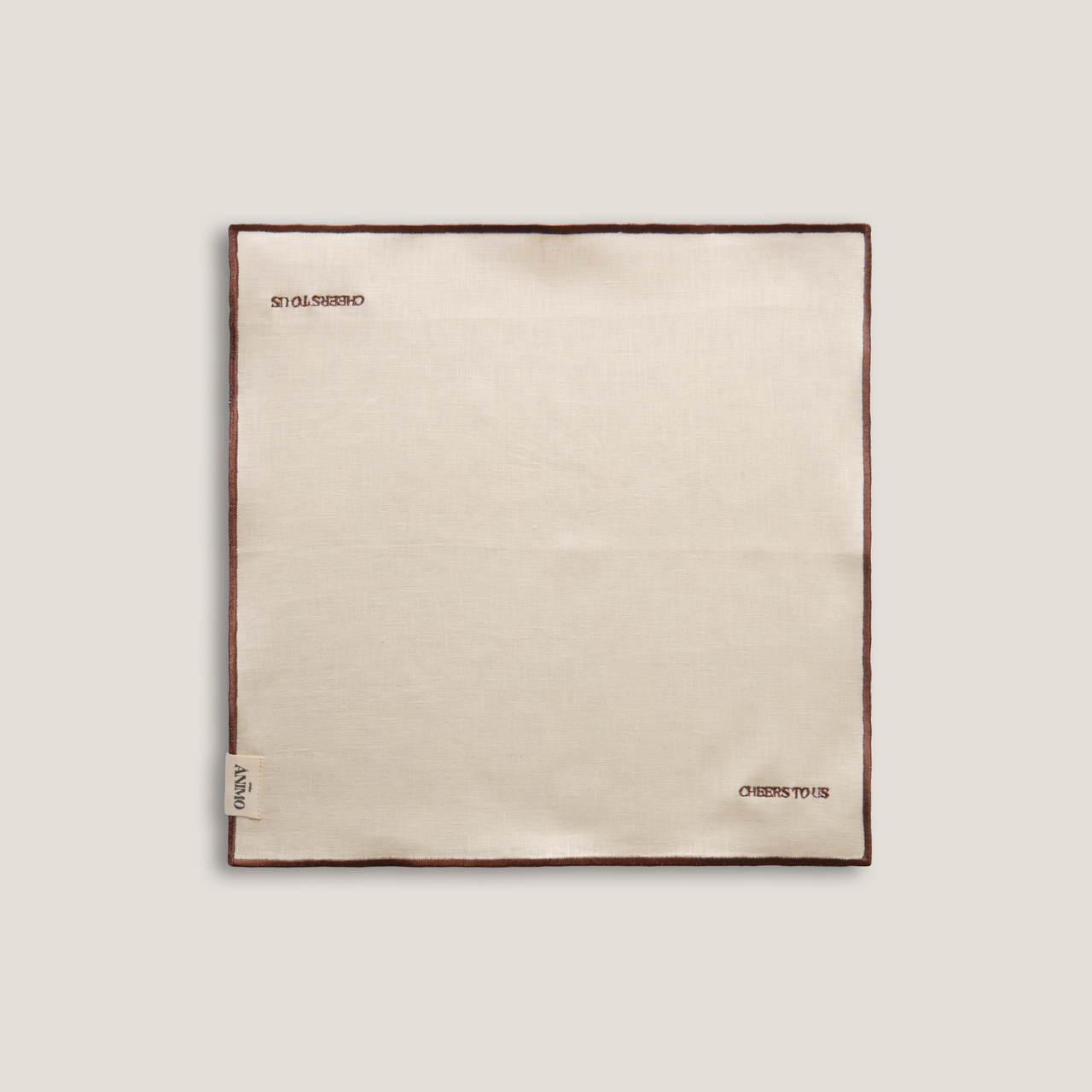 Napkins 'cheers to us' in beige 